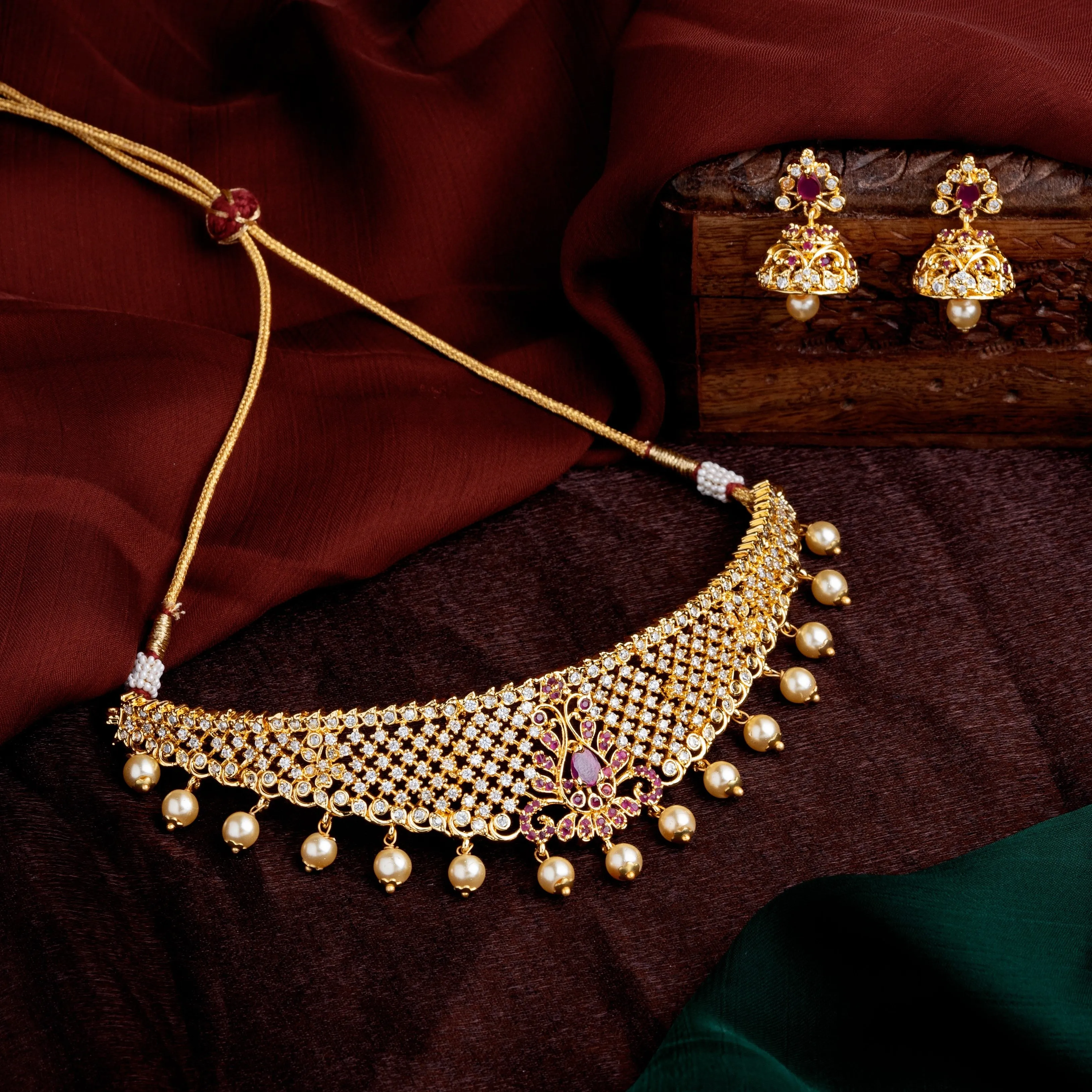 Estele Gold Plated CZ Traditional Bridal Choker Set with Pearls & Ruby Crystals for Women